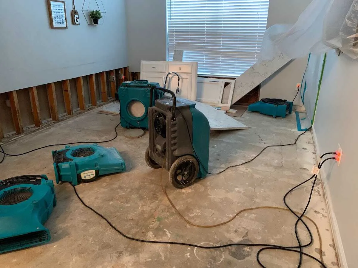 Dehumidifier in flood-cut room for Water Damage Restoration in Tabernacle
